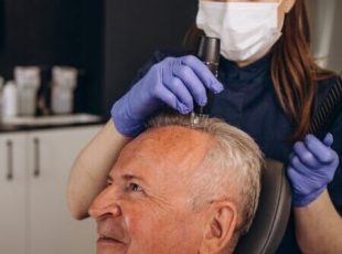 Senior man is being examined by a trichologist. Hair care concept